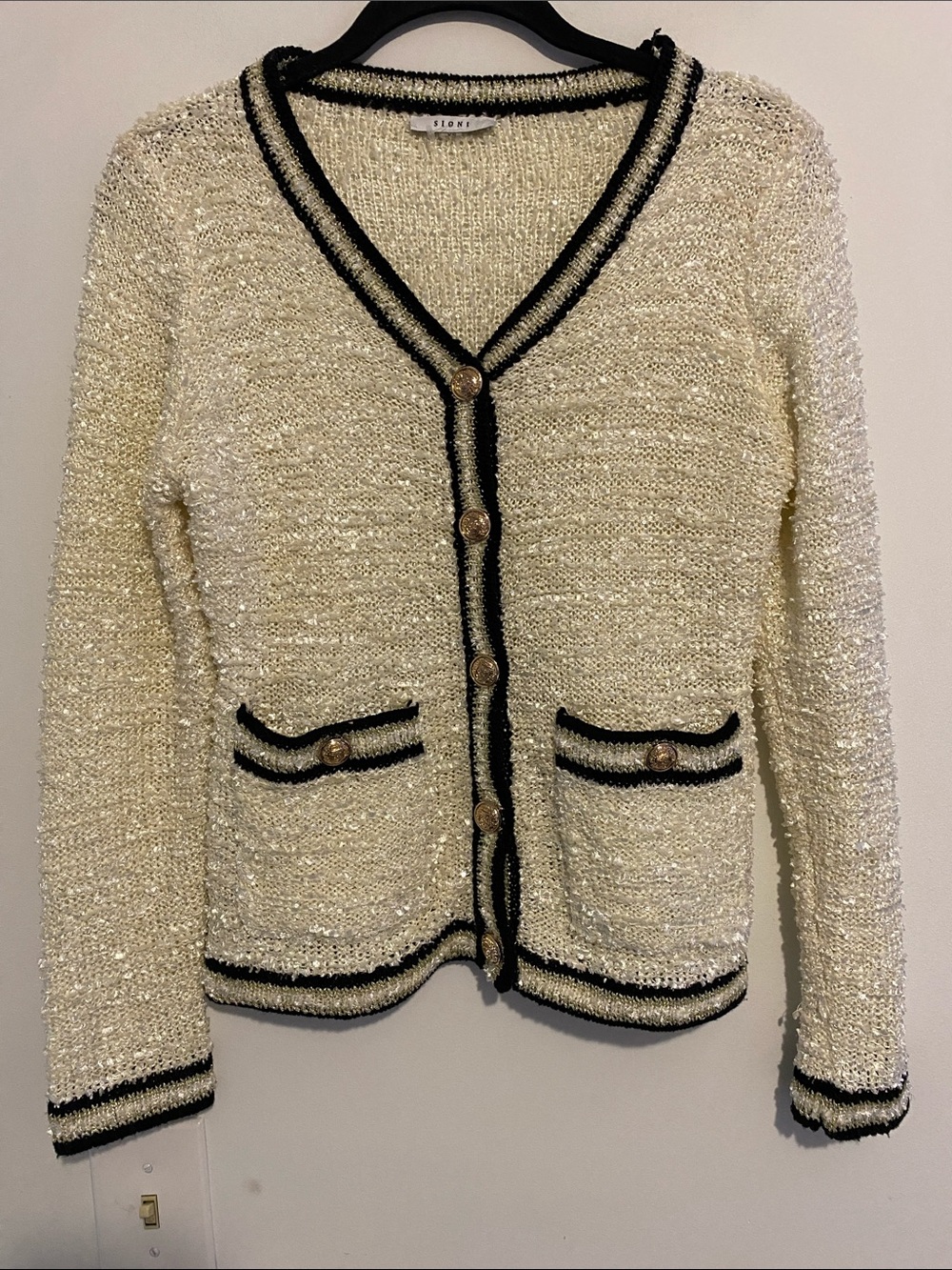 Sioni Cream Bouclé Cardigan with Black Trim and Gold Buttons